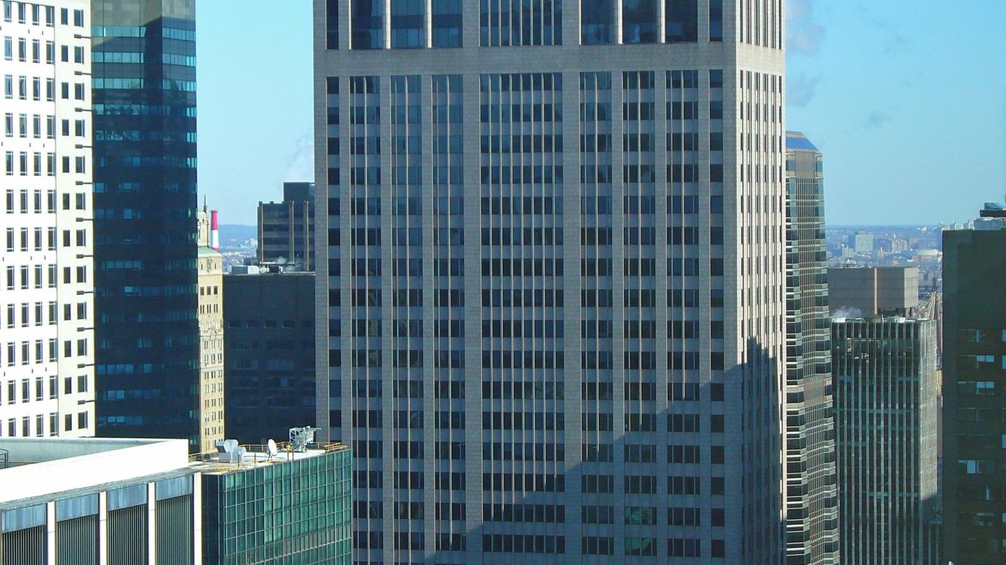 The AT&T Building at 550 Madison Avenue in Manhattan, its granite tower topped by a giant broken pediment with a circular opening, the roofline critics nicknamed Chippendale